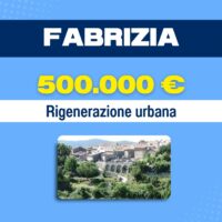 Fabrízia: paesaggio urbano rigenerato con edifici storici, verde lussureggiante e panorama sereno; 500.000 € di rigenerazione urbana.
