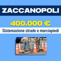 Lavoratori in cantiere tra coni arancioni, segnaletica e frecce: interventi di sistemazione strade e marciapiedi a Zaccanopoli.